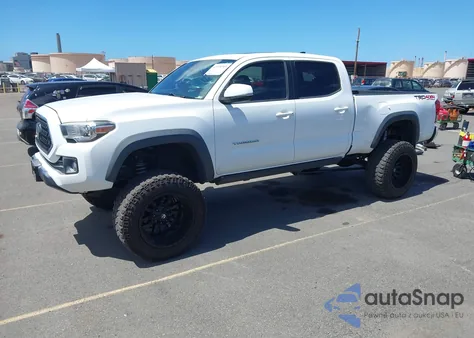 2018 Toyota Tacoma Trd Sport из США, поврежденный, VIN 3TMDZ5BN8JM037471